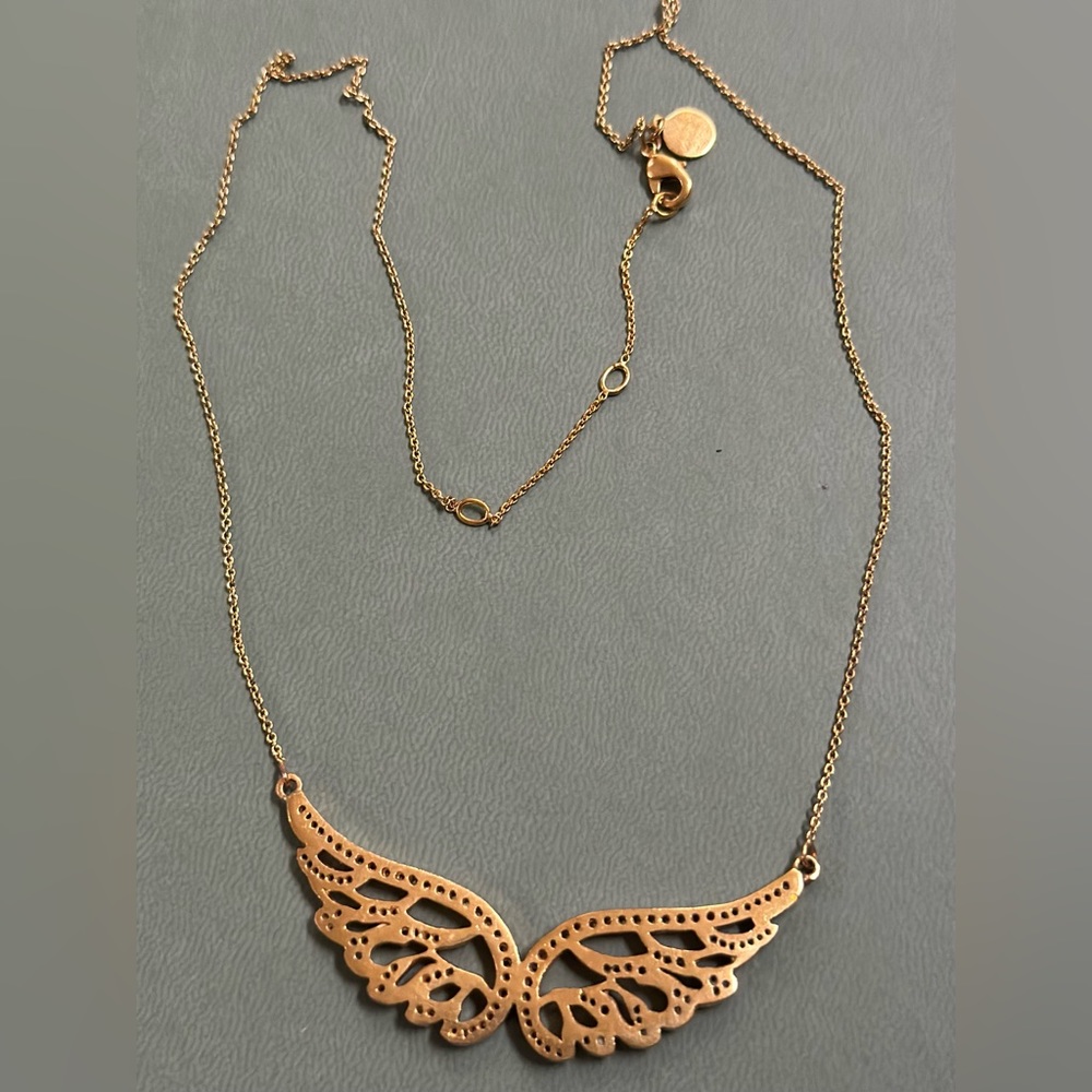 Angel wins necklace